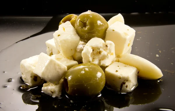 Feta - olives - garlic — Stock Photo, Image