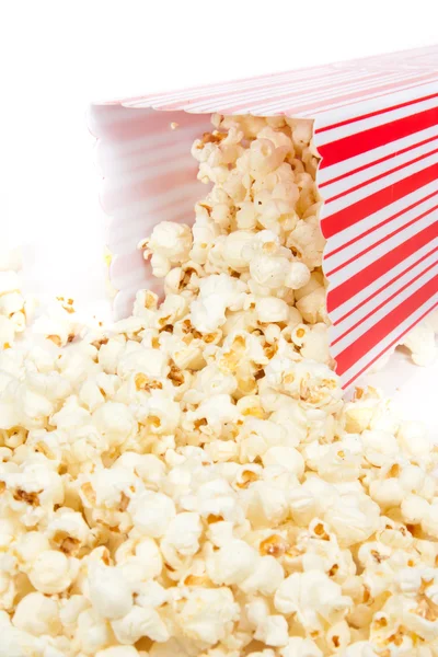 Full bucket of popcorn dropped isolated on white — Stock Photo ...