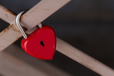 Red lock in the shape of heart clipart