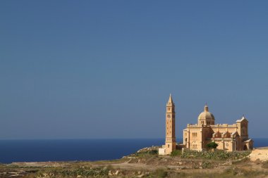 Church at the coast of Malta clipart