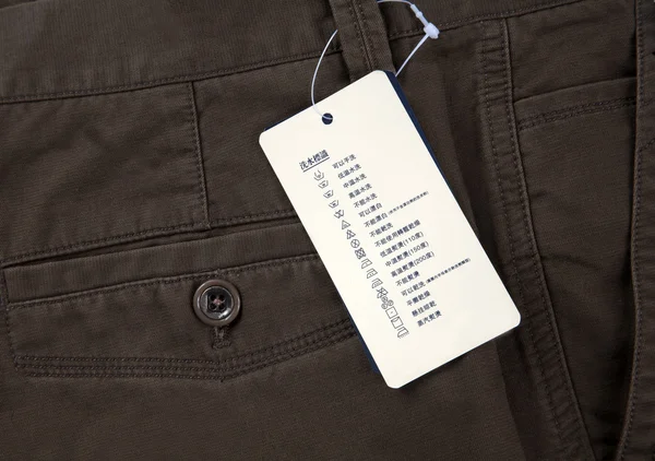 Wash label on pants — Zdjęcie stockowe