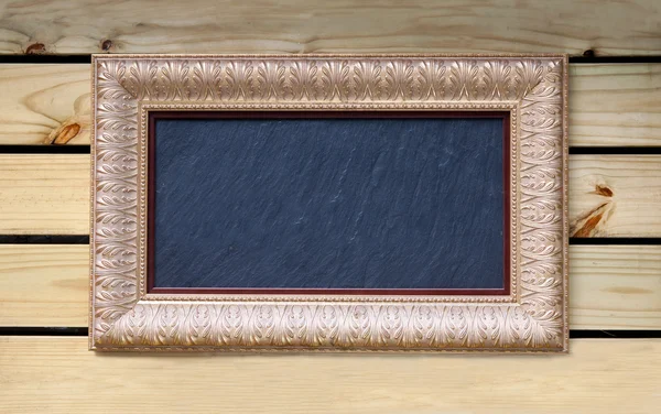 Schilderij frame op hout — Stockfoto