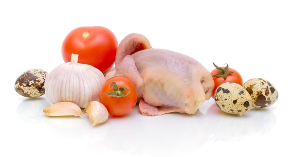 Vegetables, eggs and quail carcass on a white background — Stock Photo, Image