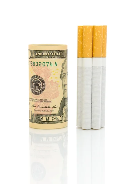 Money and cigarettes on a white background — Stock Photo, Image