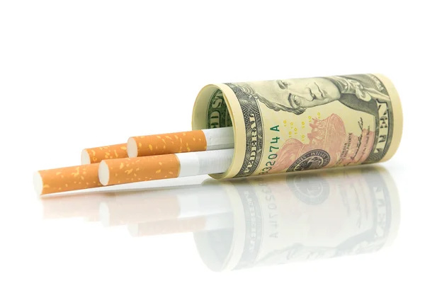 Cigarettes and money close-up — Stock Photo, Image