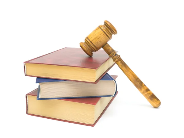 Stack of books and gavel on white background — Stock Photo, Image
