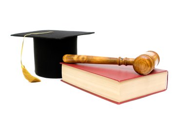 Gavel, book and a graduate hat on a white background clipart