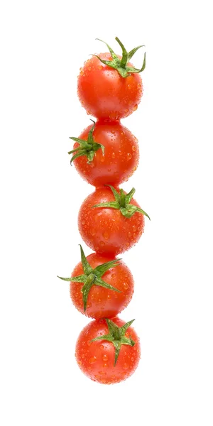 Tomates cherry sobre un fondo blanco — Foto de Stock