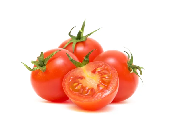 Tomates cereja em um fundo branco closeup — Fotografia de Stock