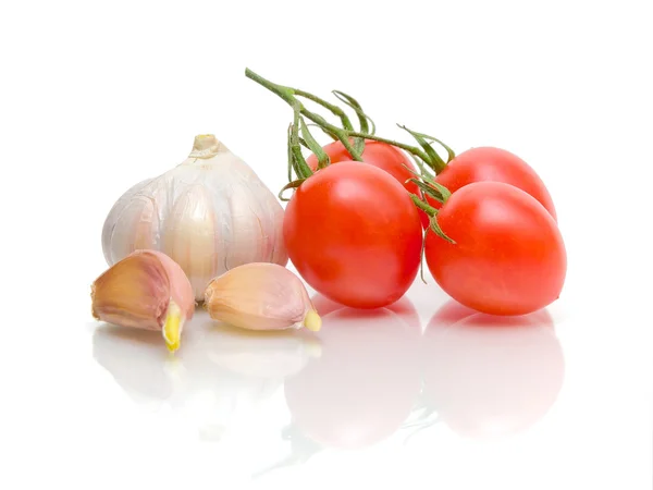 Garlic and tomatoes close up — Stock Photo, Image
