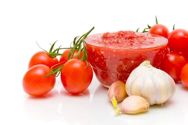 Tomato sauce and ingredients on a white background — Stock Photo, Image