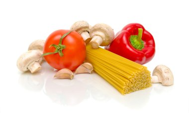 Pasta, peppers, tomatoes, garlic and mushrooms close up