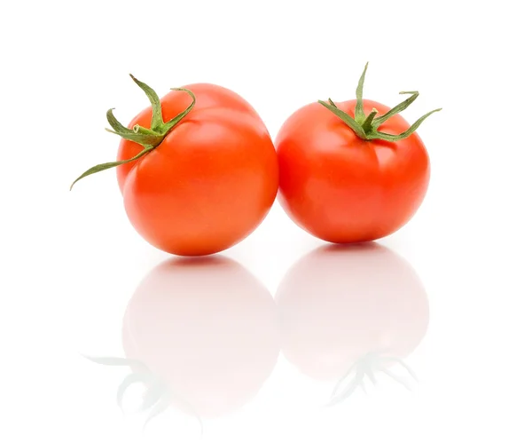 Stora mogna tomater på en vit bakgrund — Stockfoto