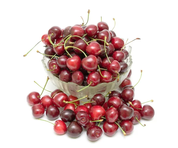 Cherry in a glass bowl on a white background — Stock Photo, Image
