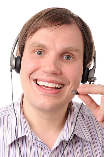 Homme souriant avec écouteurs et microphone — Photo