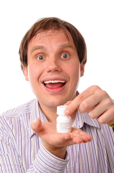 Hombre sonriente con una botella Imágenes de stock libres de derechos