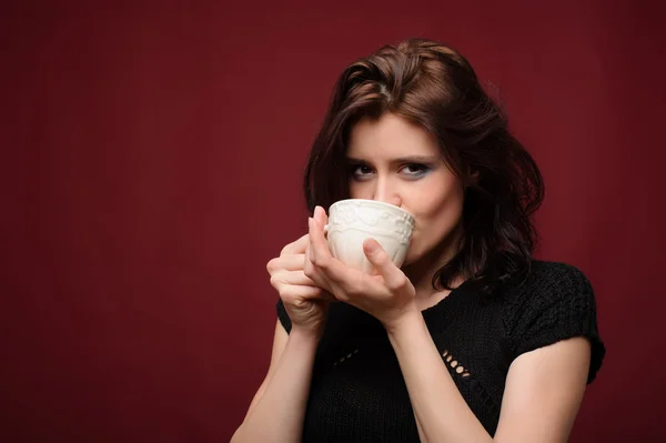 stock image Beautiful woman with cup of tea or coffee