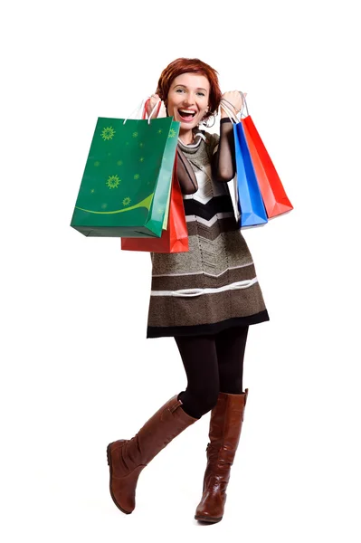 Mulher atraente segurando sacos de compras — Fotografia de Stock