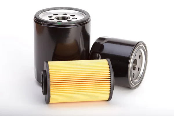 Three new oil filters — Stock Photo, Image
