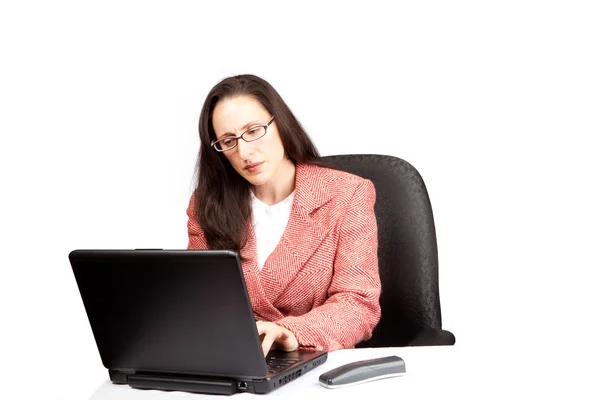 Adult Businesswoman woking on laptop Stock Image