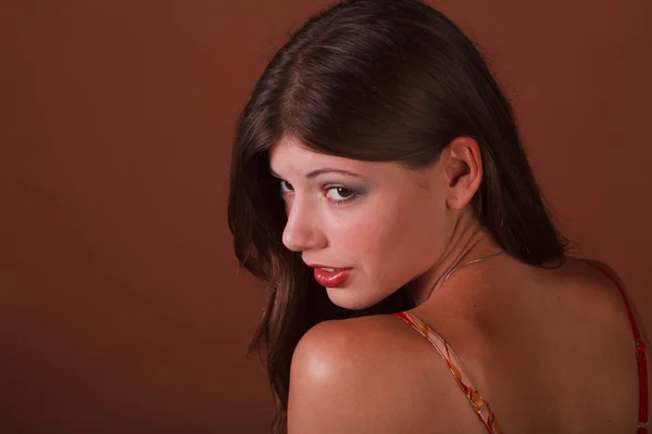 Sexy brunette looking back — Stock Photo, Image