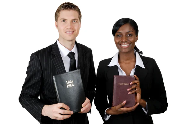 Christliche Berater halten Bibeln in der Hand Stockbild