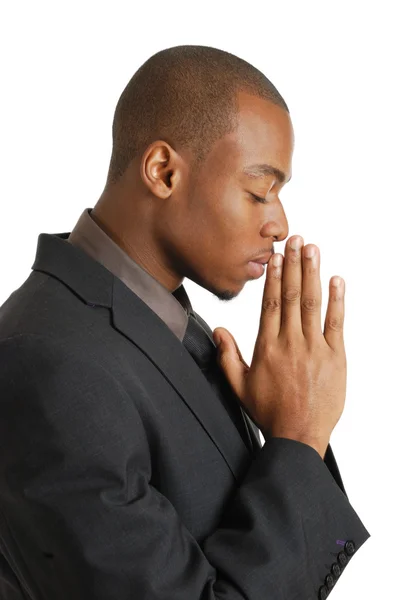 Ділова людина молиться закритими очима — стокове фото