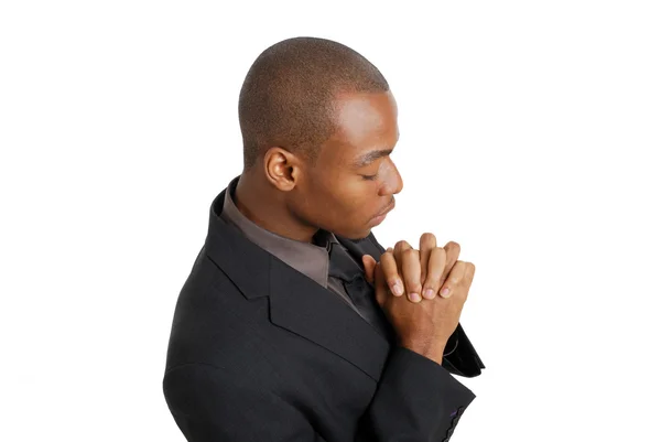 Homem de negócios orando com os olhos fechados — Fotografia de Stock