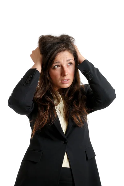 Mulher de negócios com as mãos na cabeça devido ao fracasso — Fotografia de Stock