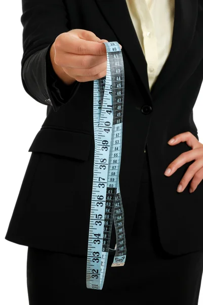 Business woman holding a measuring tape cropped — Stock Photo, Image