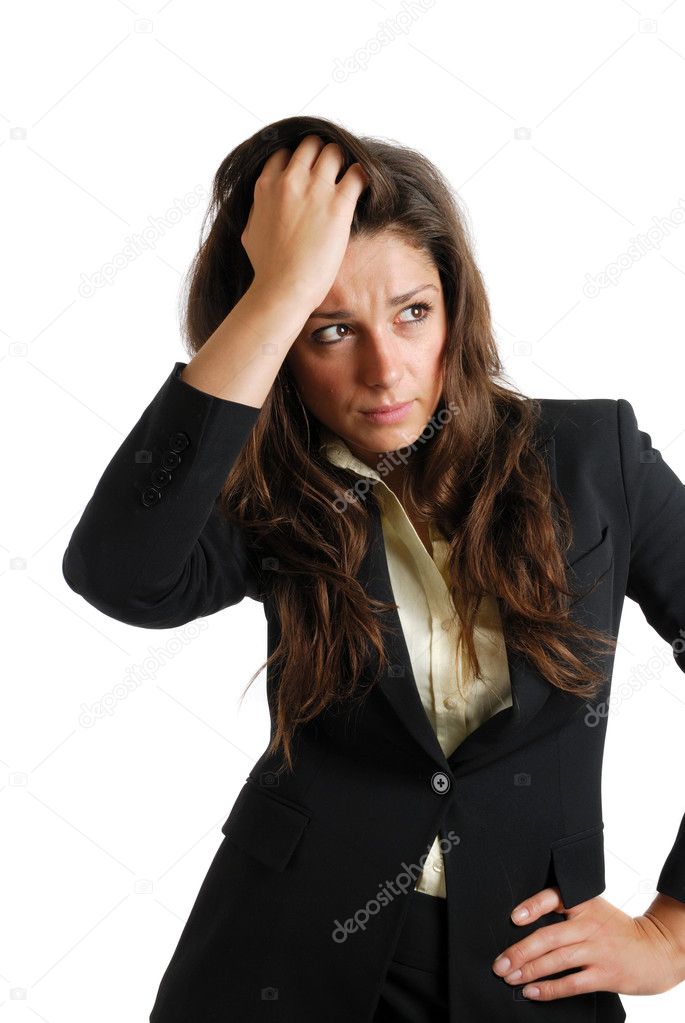 Business woman with her hands on her head due failure