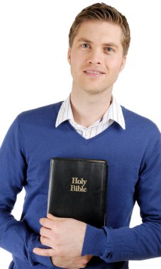 Man holding a bible showing commitment clipart