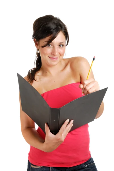 Estudante feminina segurando uma pasta e lápis — Fotografia de Stock