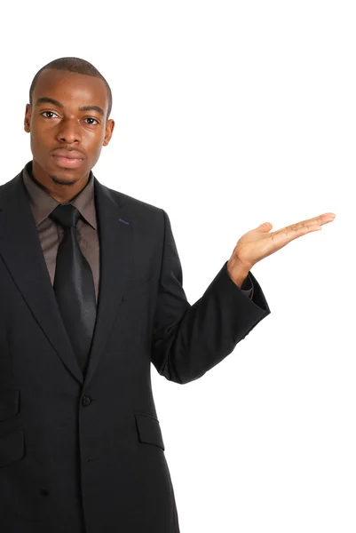 Hombre de negocios afroamericano con la mano levantada en copyspace —  Fotos de Stock