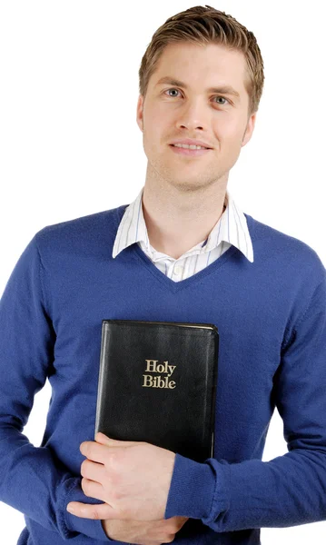 Homem segurando uma bíblia mostrando compromisso — Fotografia de Stock