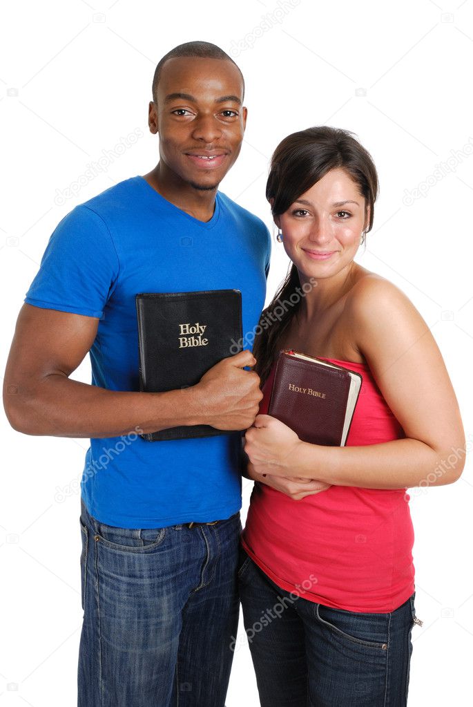 Student couple holding bibles