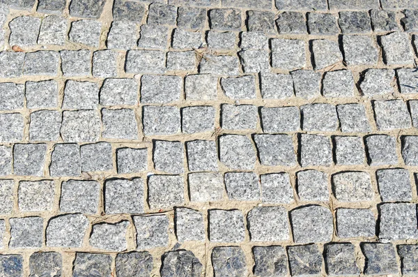 Cobbled road as background — Stock Photo, Image