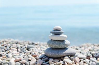Stack of zen stones on beach