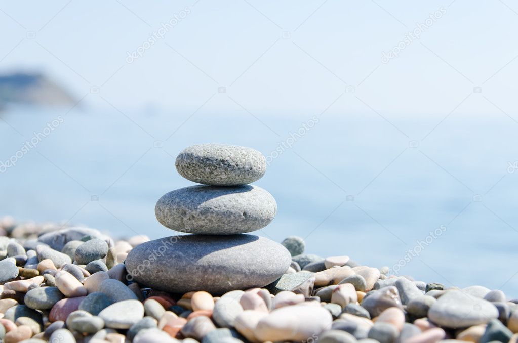 Stack of zen stones near sea