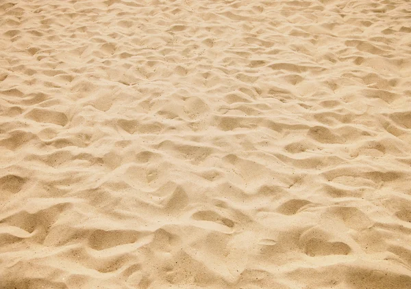 Textuur van geel zand — Stockfoto