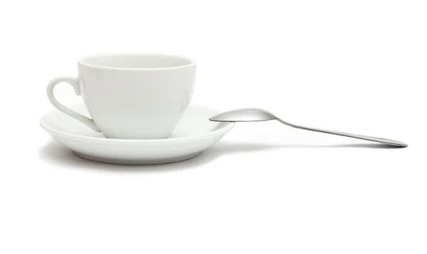 stock image White cup with spoon and saucer