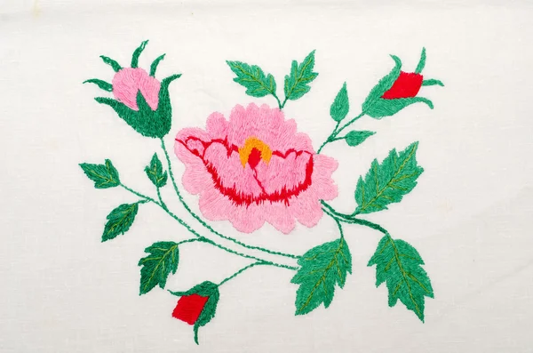 Roses as handicraft embroidery good — Stock Photo, Image