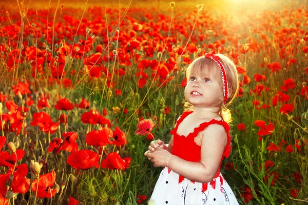 Happy smiling little fun girl in poppies field, sunset outdoors portrait — Stock Photo, Image