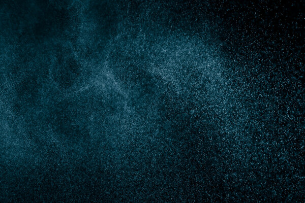 Snowstorm.Water dust in motion like snow. Abstract Background