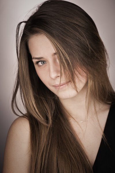 Portrait of young attractive brunette girl