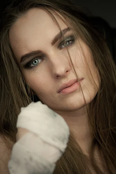 Long haired beauty with the fists — Stock Photo, Image