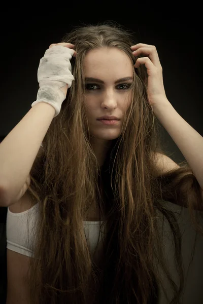 stock image Long haired beauty with the fists