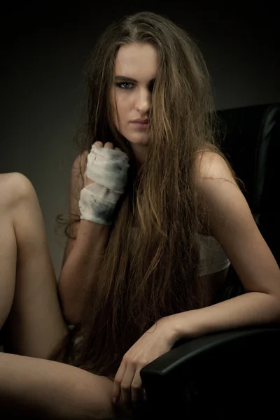 Long haired beauty with the fists — Stock Photo, Image