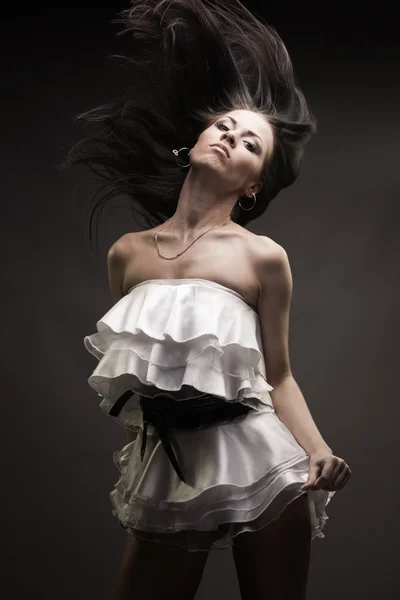 Gorgeous brunette woman dancing — Stock Photo, Image