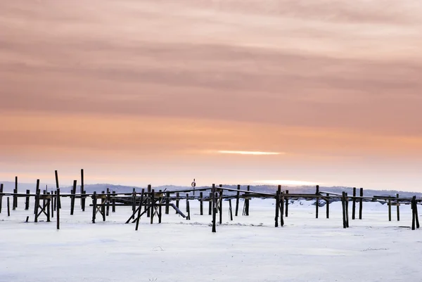 stock image Red sky and wood pier on the Onsala fjord